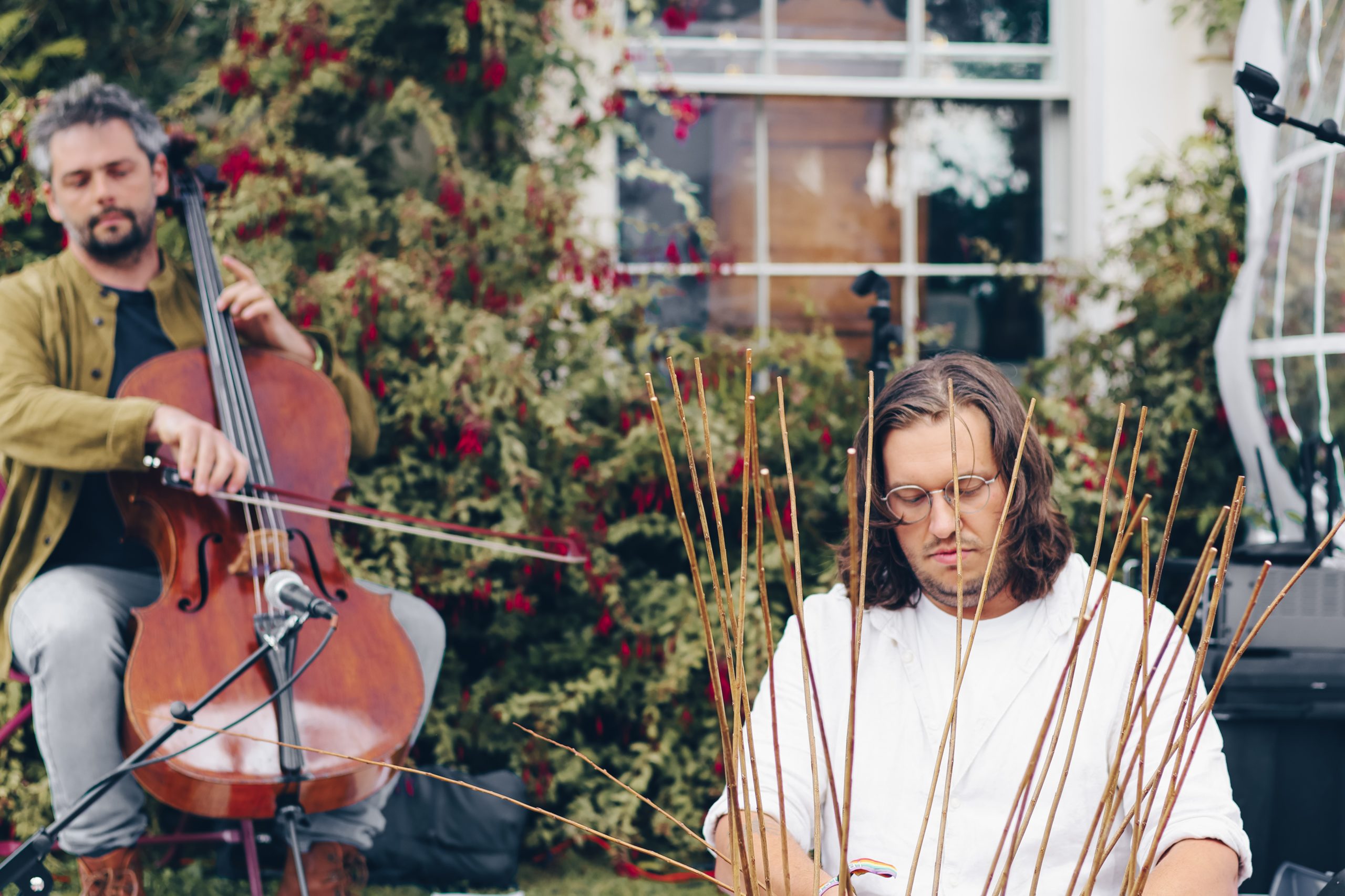 Lewis Prosser Basketmaker and Daniel Davies cellist performance at Craft Festival Wales 2025. Photo David Edmunds
