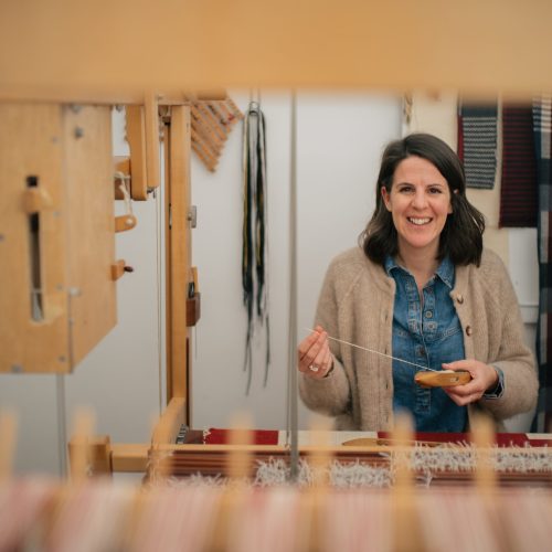 Llio James Weaver at her loom